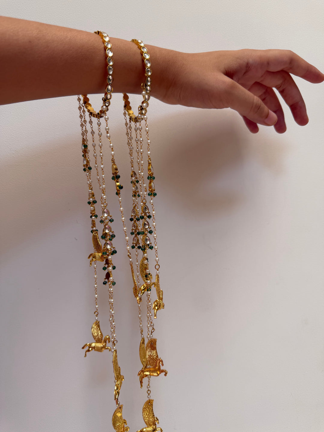 Pair of hanging bangle bracelets