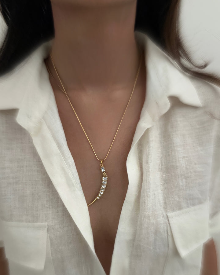 Crescent sword necklace