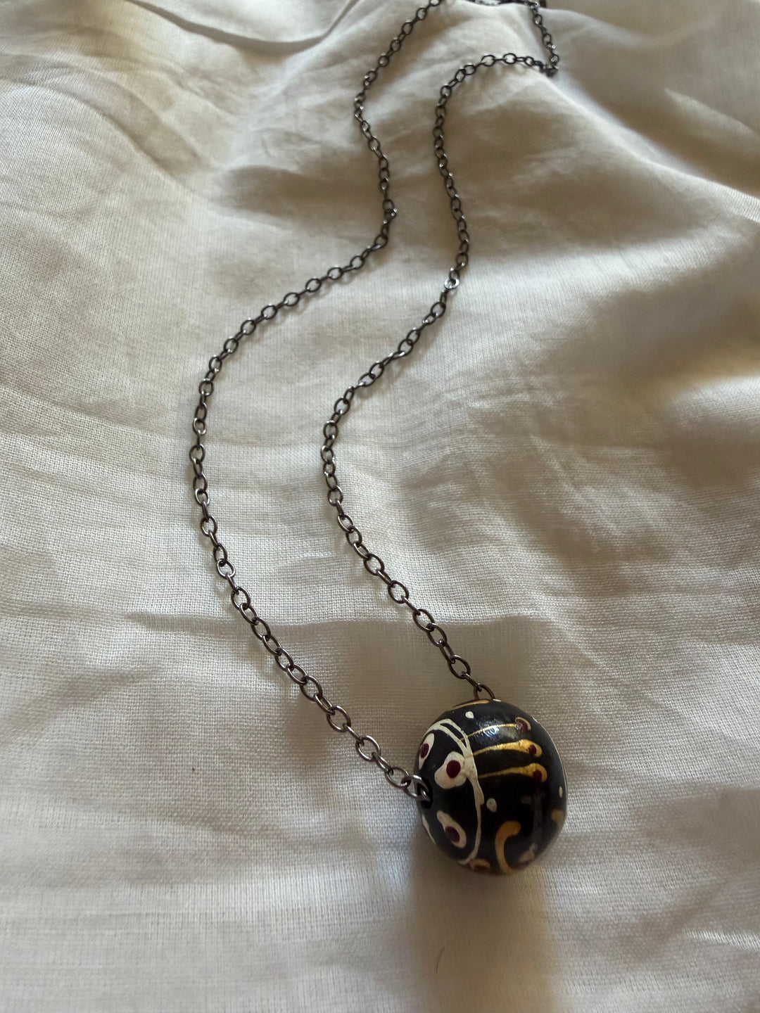 Chanting ball necklace