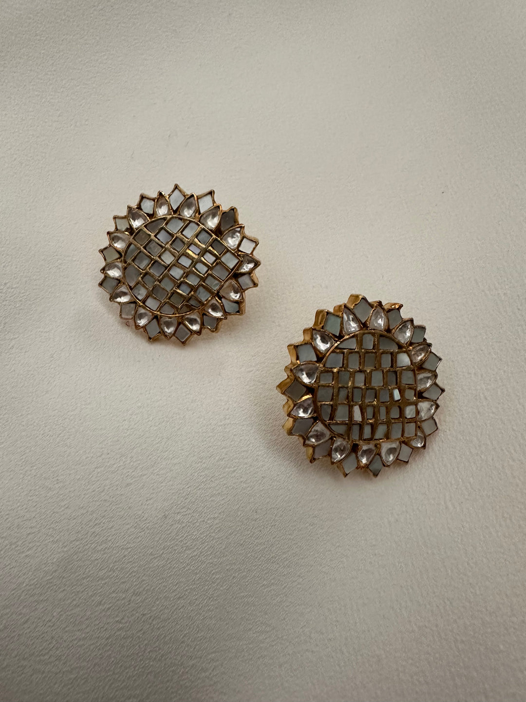 Suta milky stud earrings