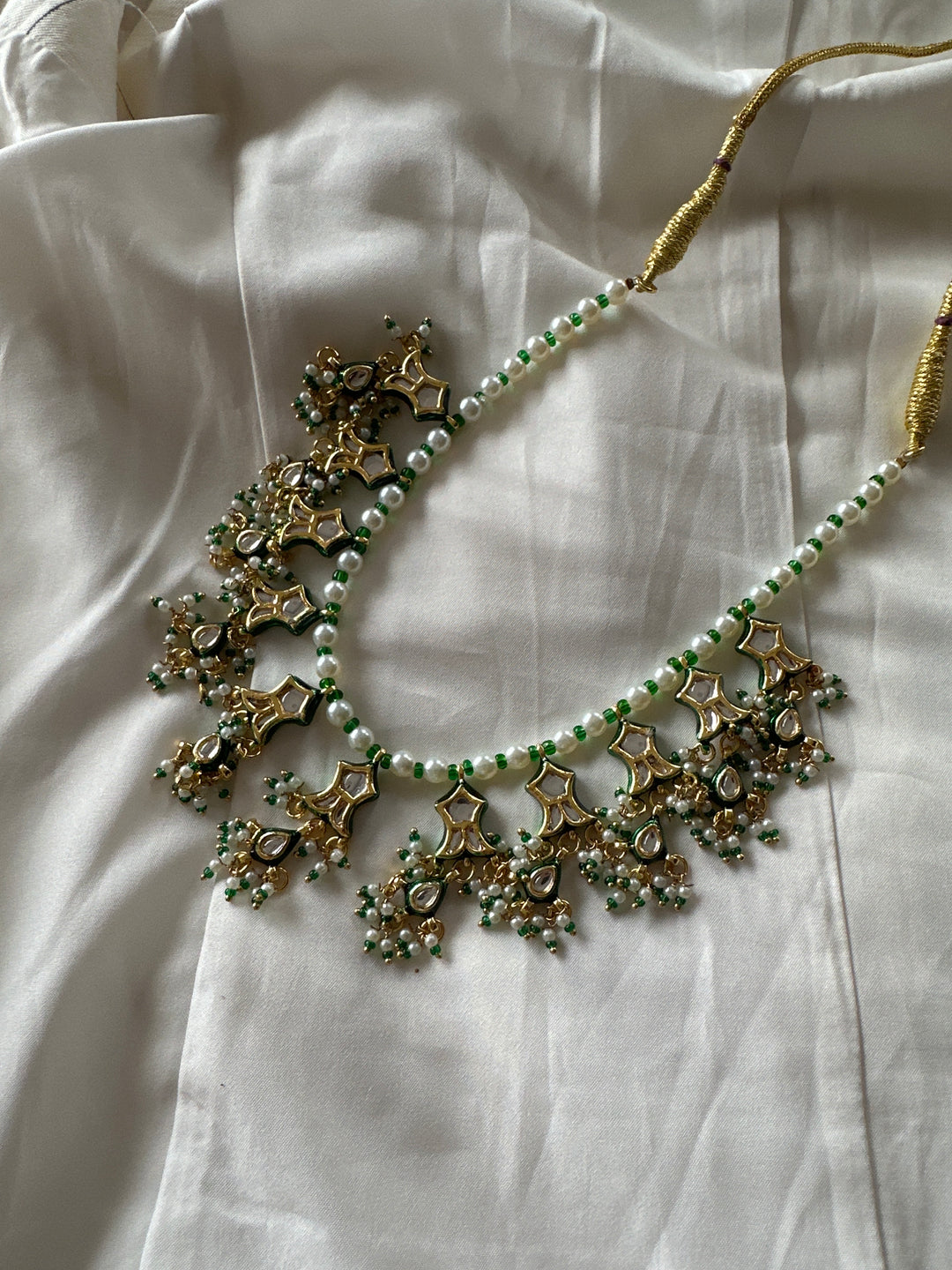 Fish jadau pearl necklace