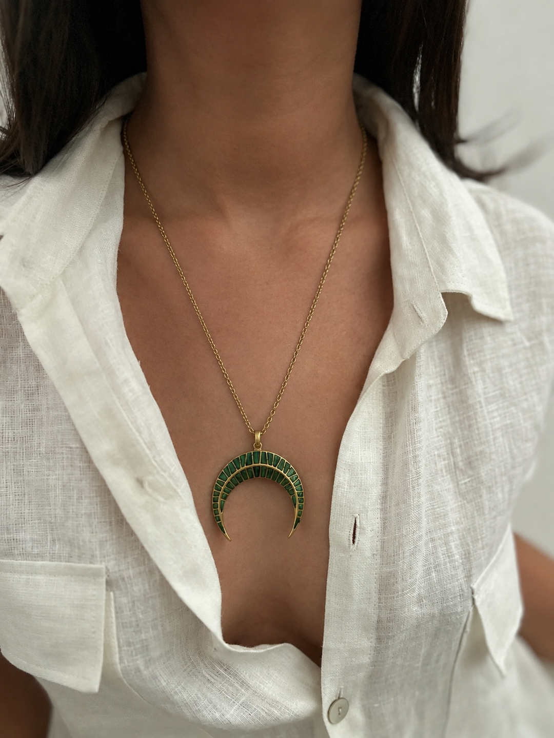 Crescent motif necklace