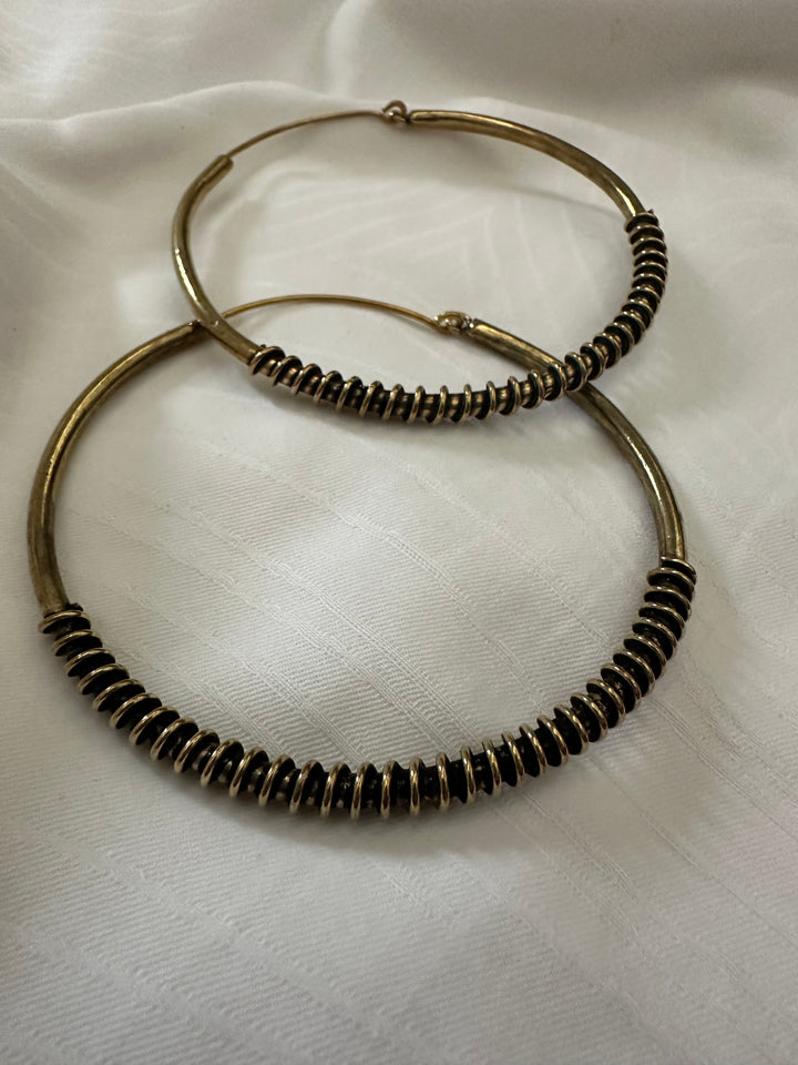 Spring twirl hoop earrings