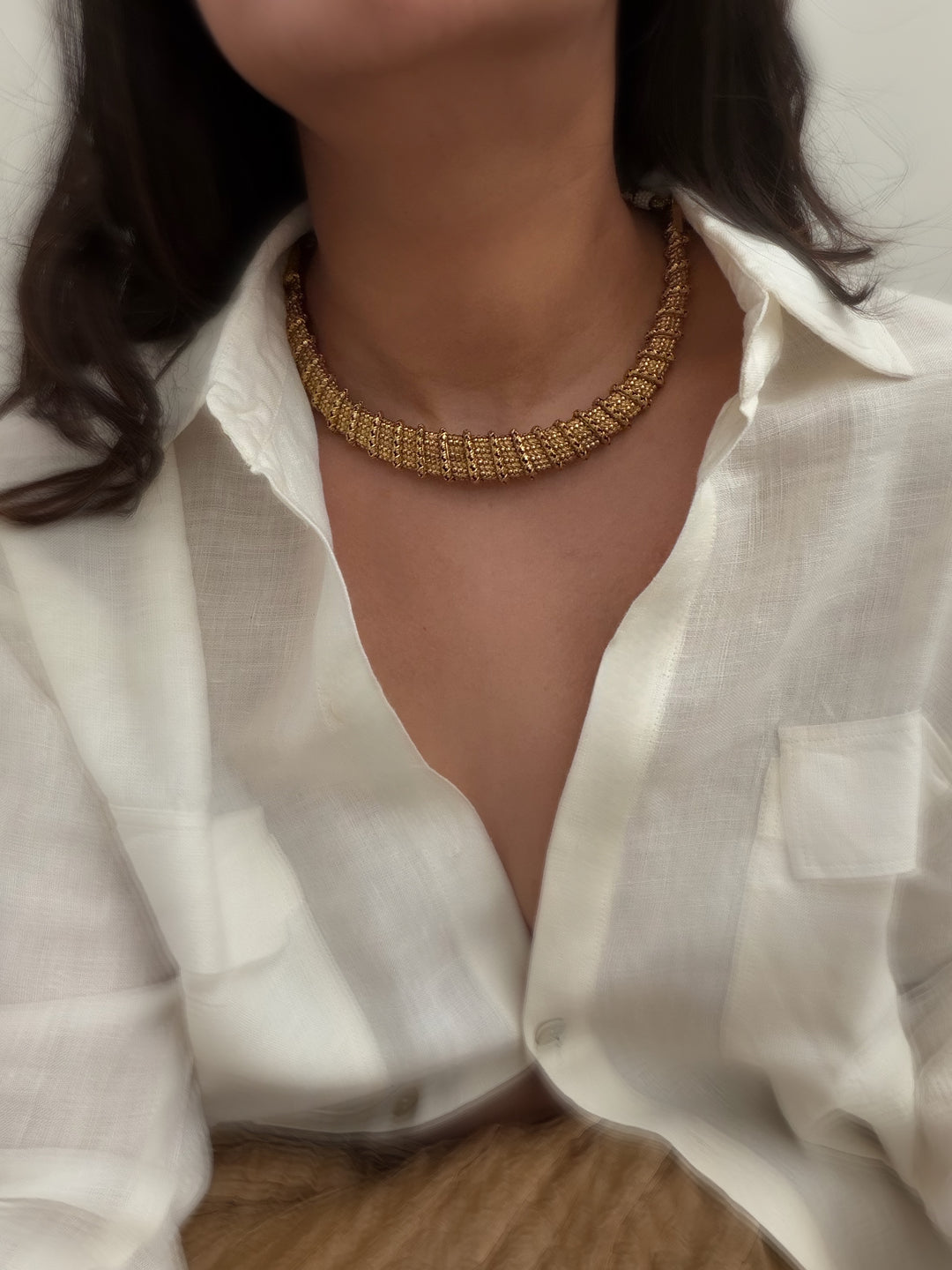 Devi drip twisted hasli necklace