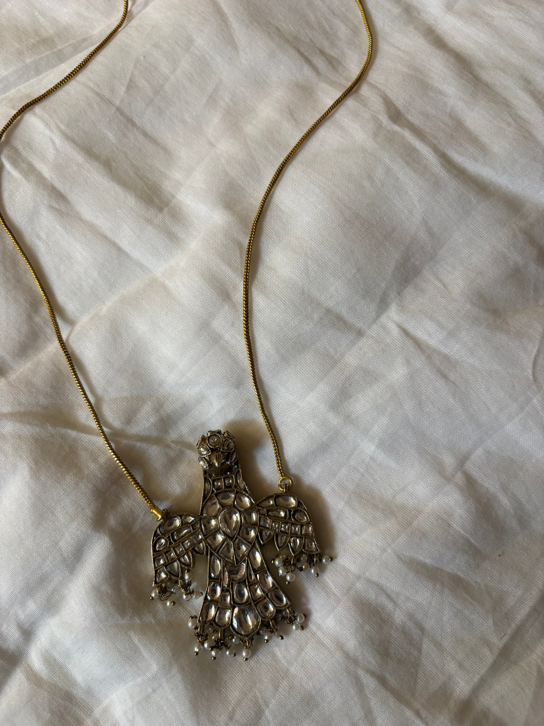 Peach haven eagle necklace