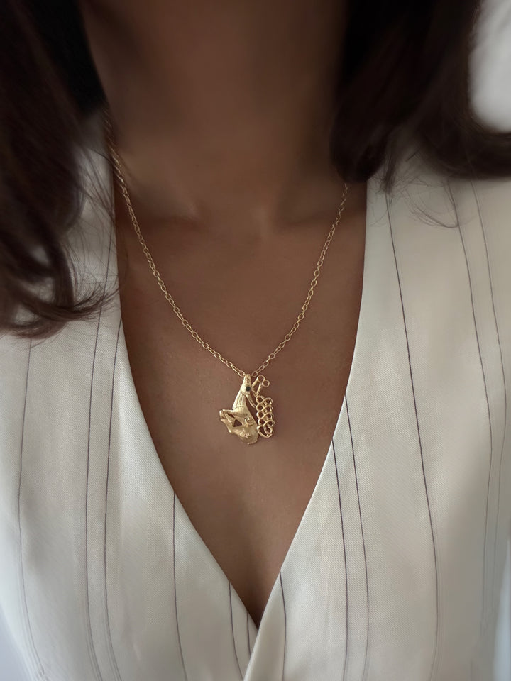 Golden stag necklace