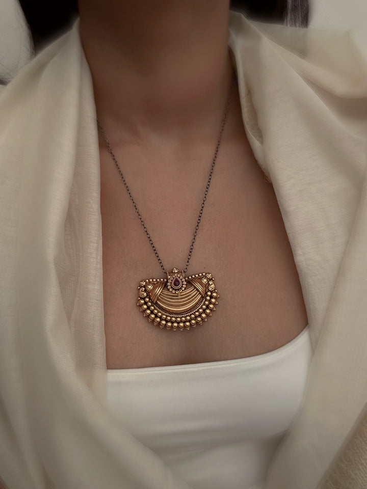 Antique motif necklace