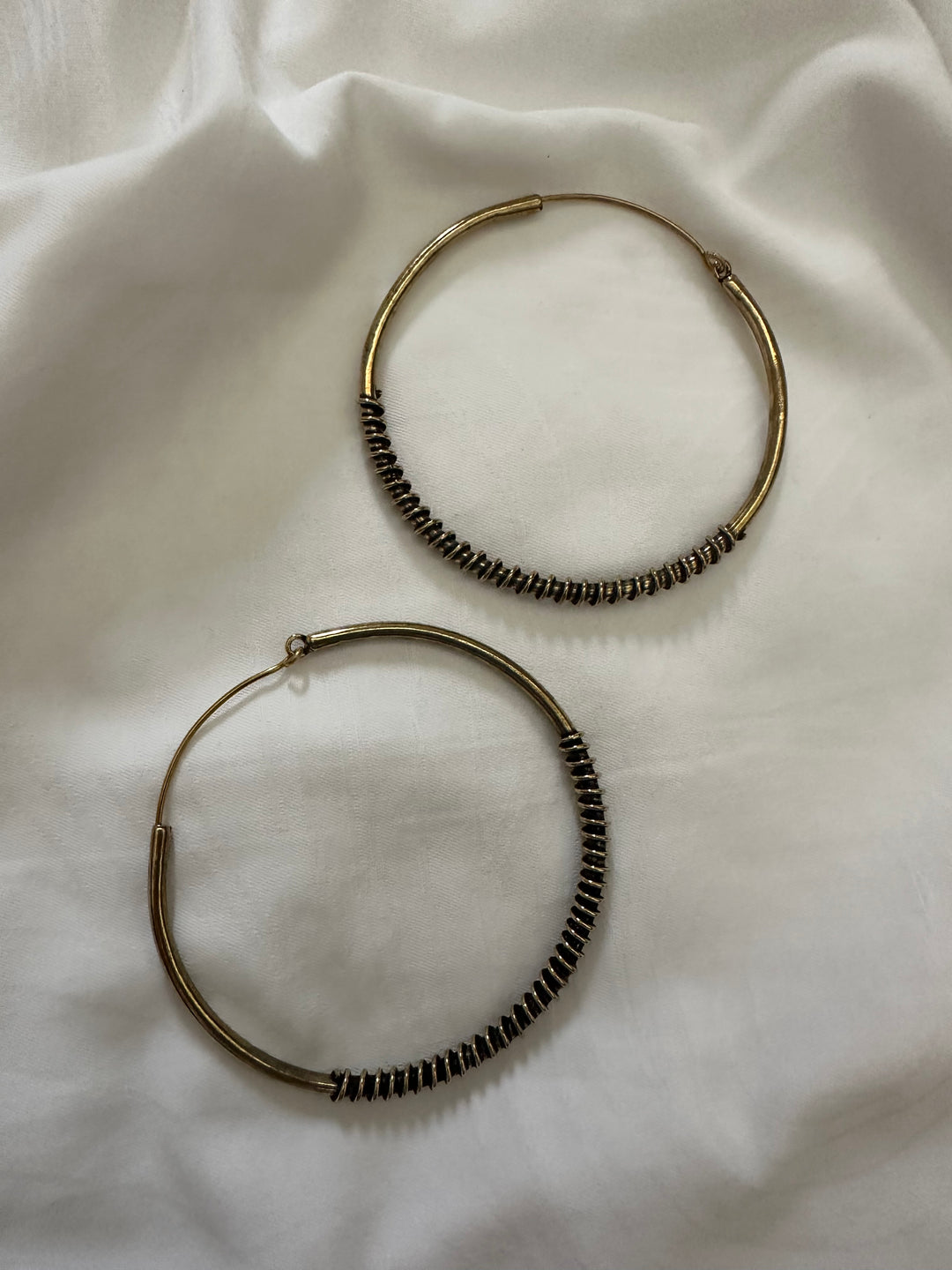 Spring twirl hoop earrings
