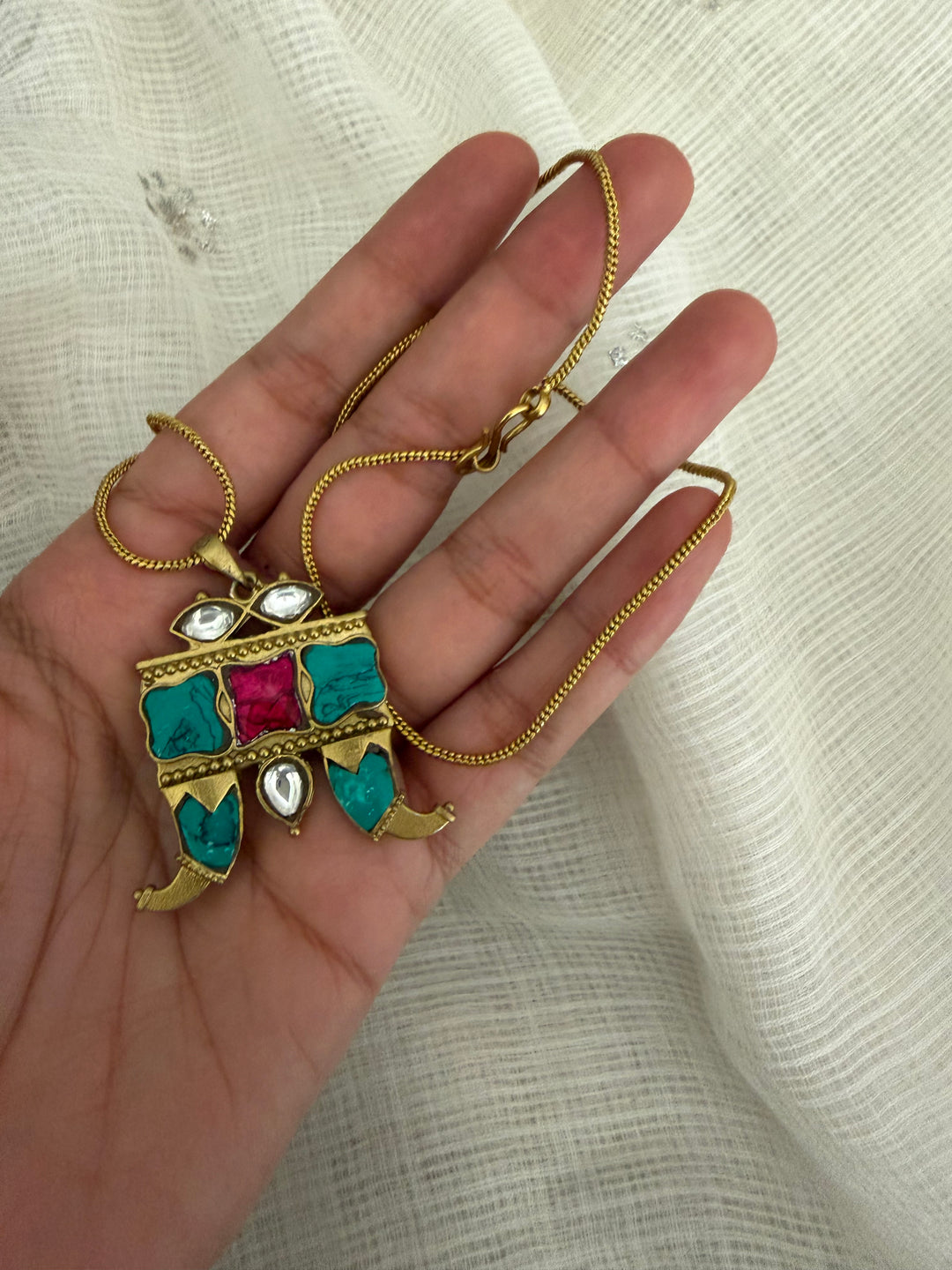 Sword motif necklace
