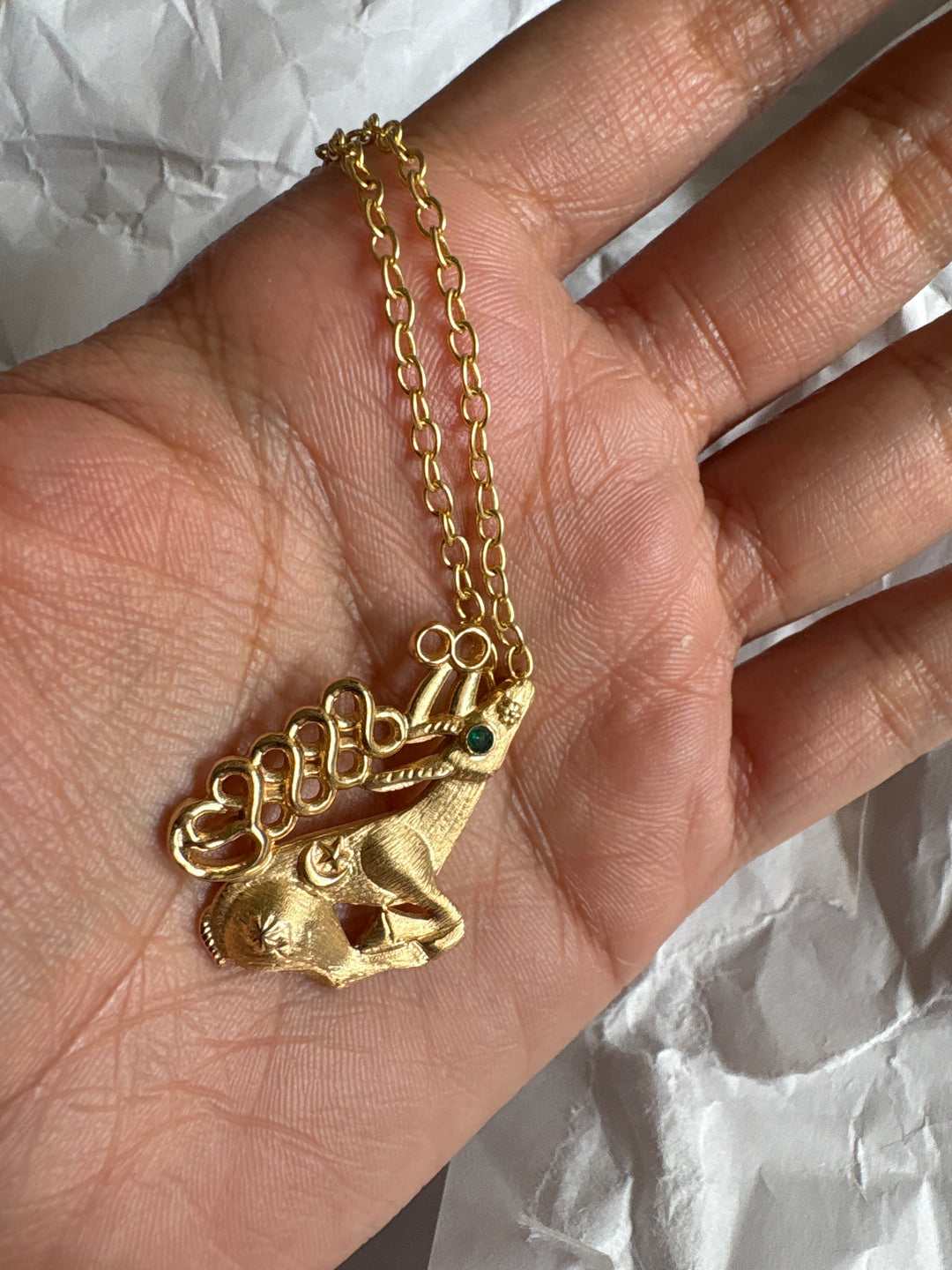 Golden stag necklace