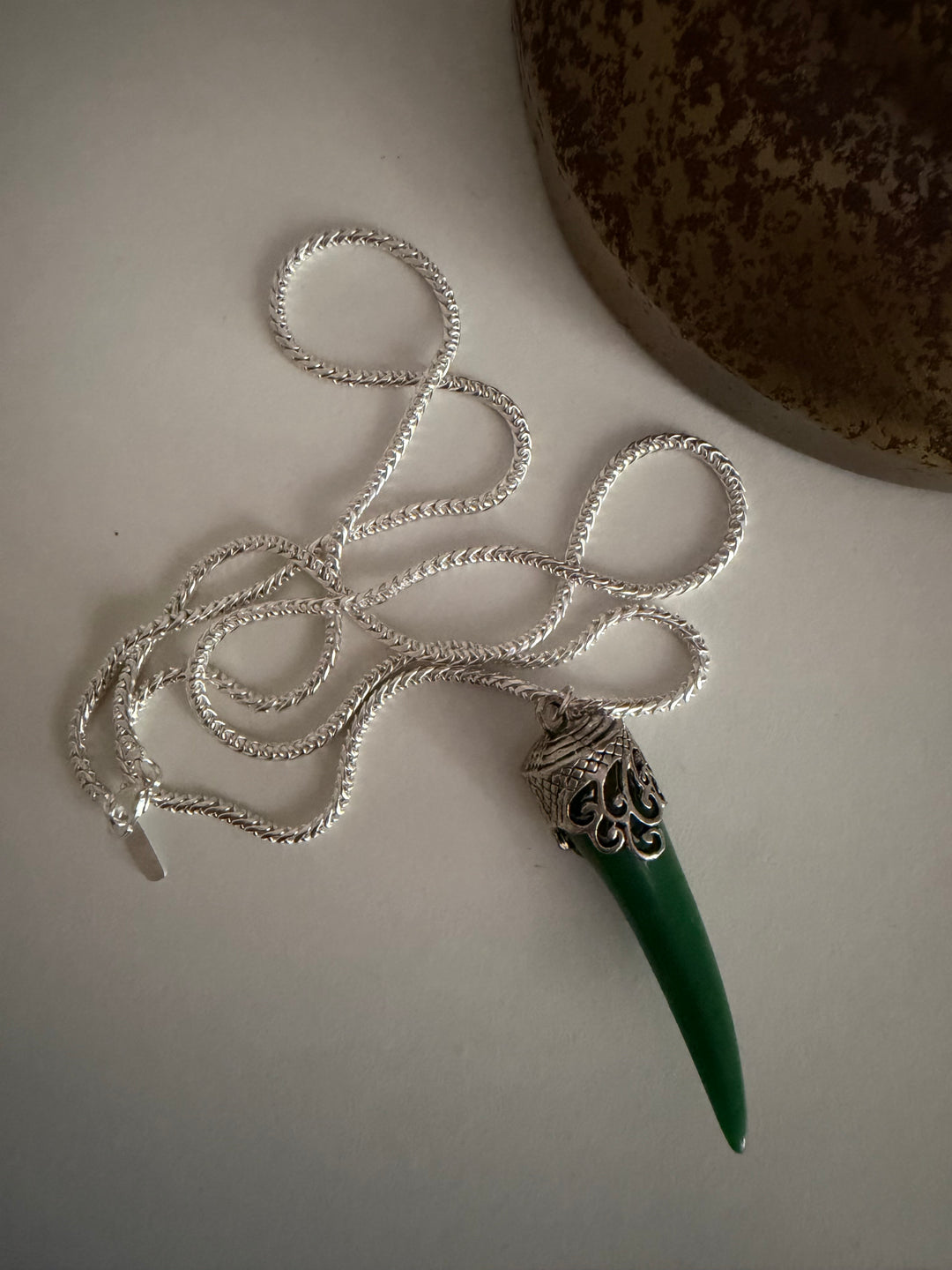 Green stone sword necklace