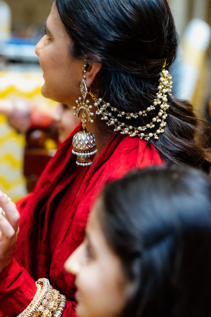 Taabir sun earrings with pearl strands