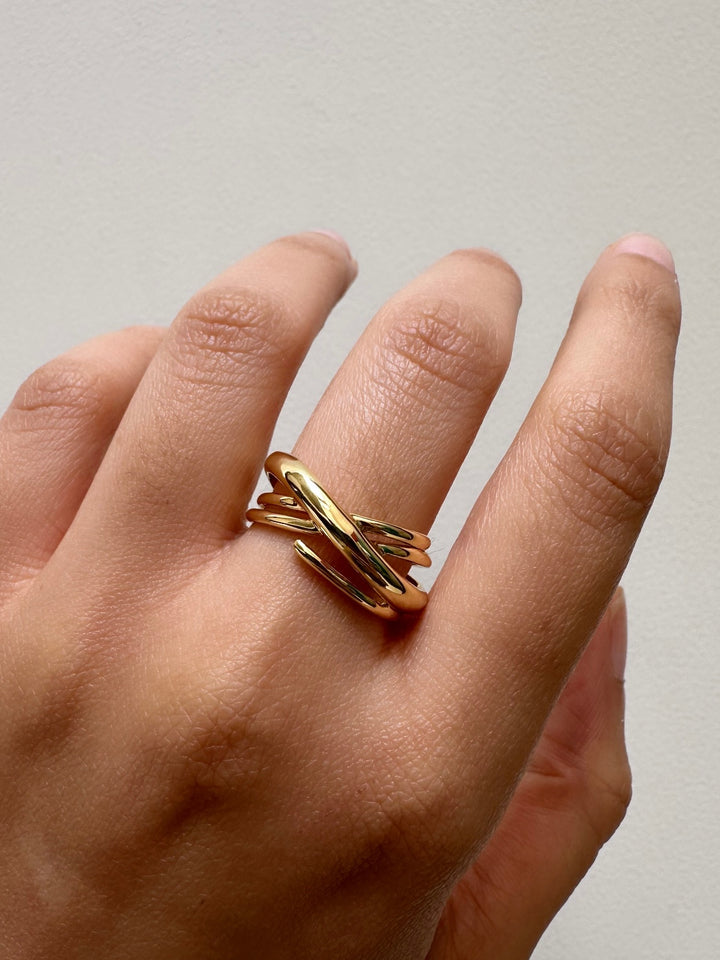 Criss cross ira ring