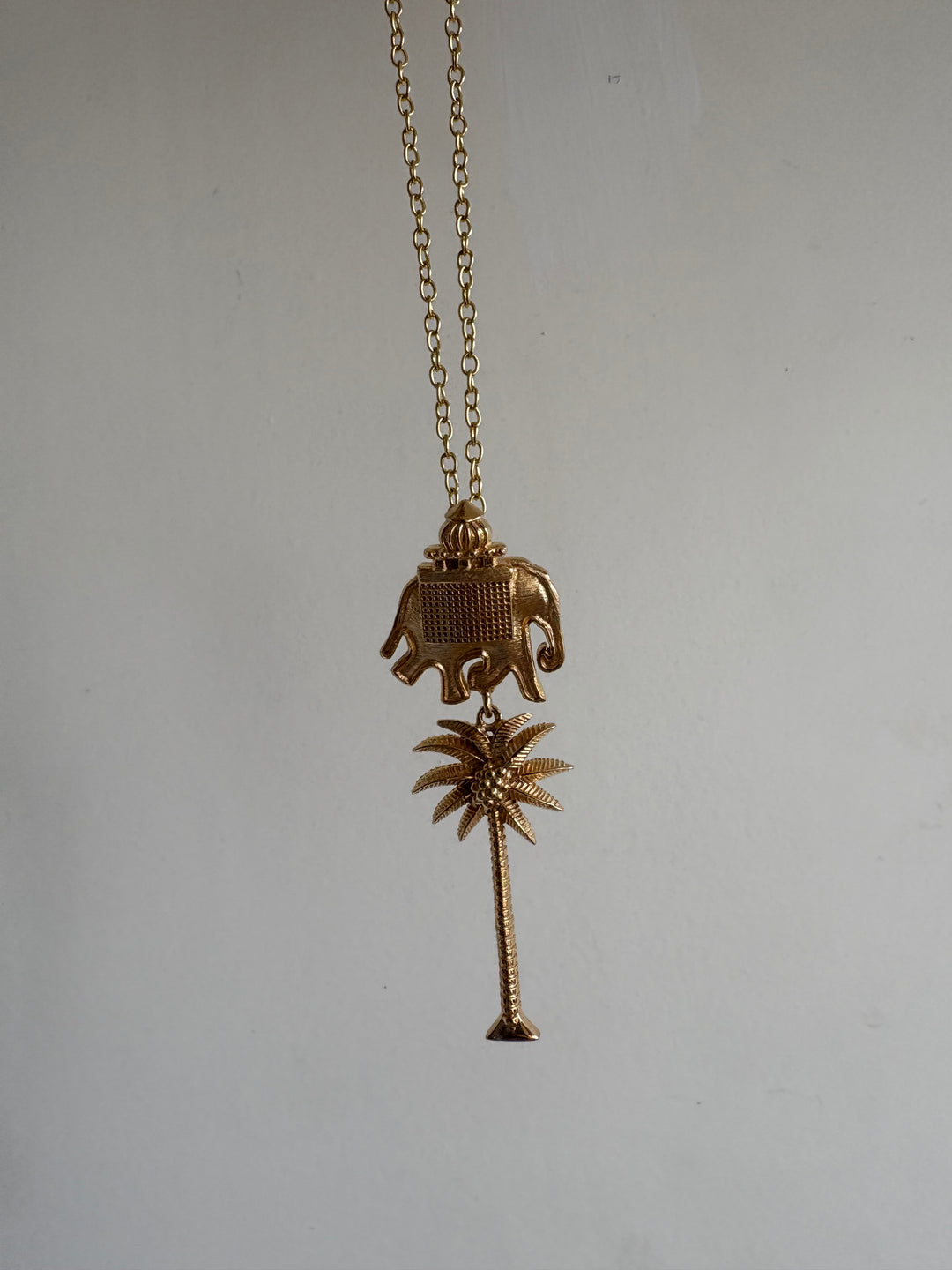 Elephant palm necklace