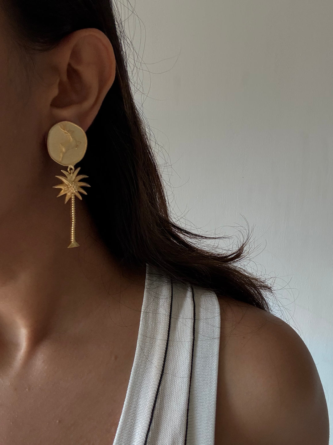 Buck palm earrings
