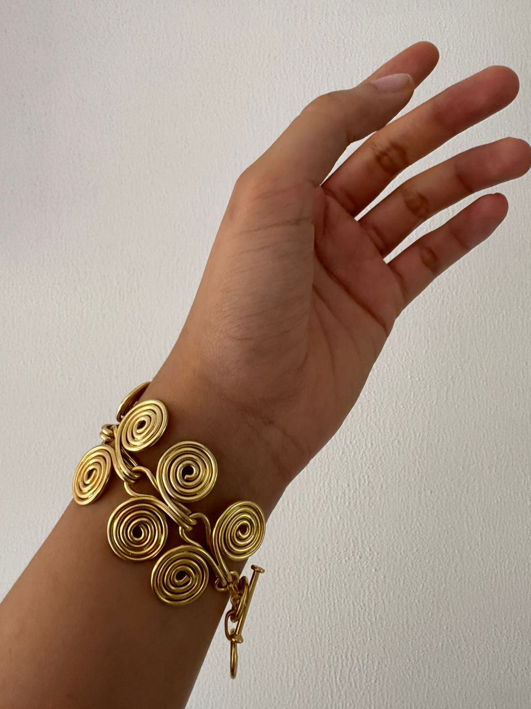 Spiral story bracelet
