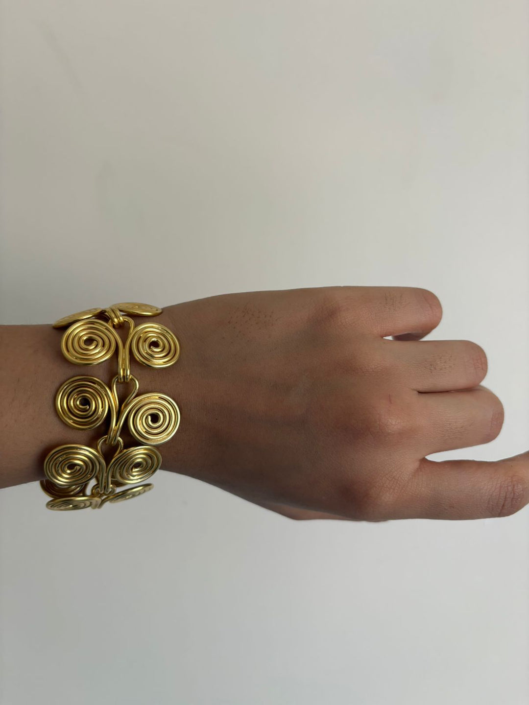 Spiral story bracelet