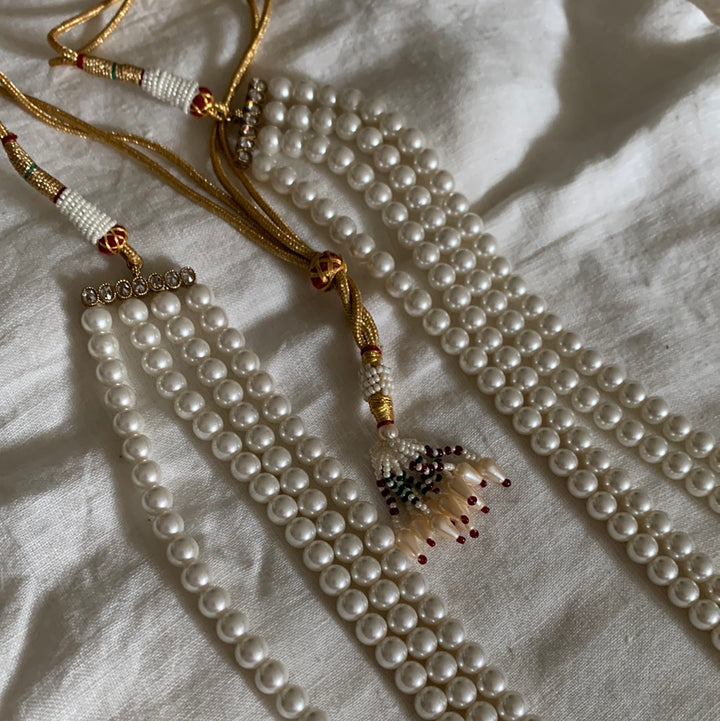 Four Pearl Strand Necklace